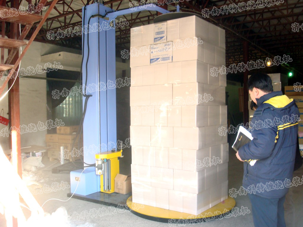 自動壓頂型托盤纏繞包裝機(jī)